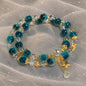 Teal Blue Crystal Beaded Bracelet with Golden Charms